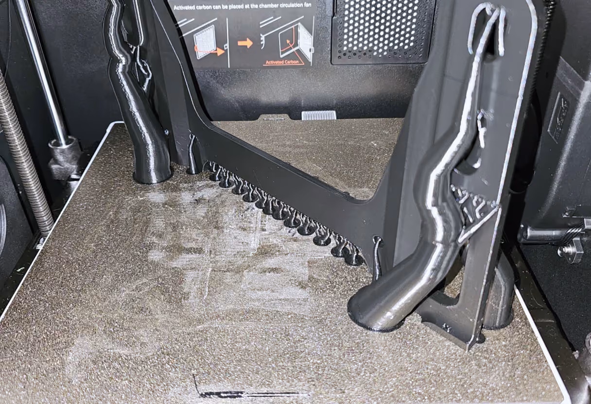 A finished 3D printed automotive transmission mount prototype